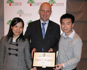 Angela Chua, Marcel de Bruin and Eric Kwan proudly display their award certificate (from left to right)